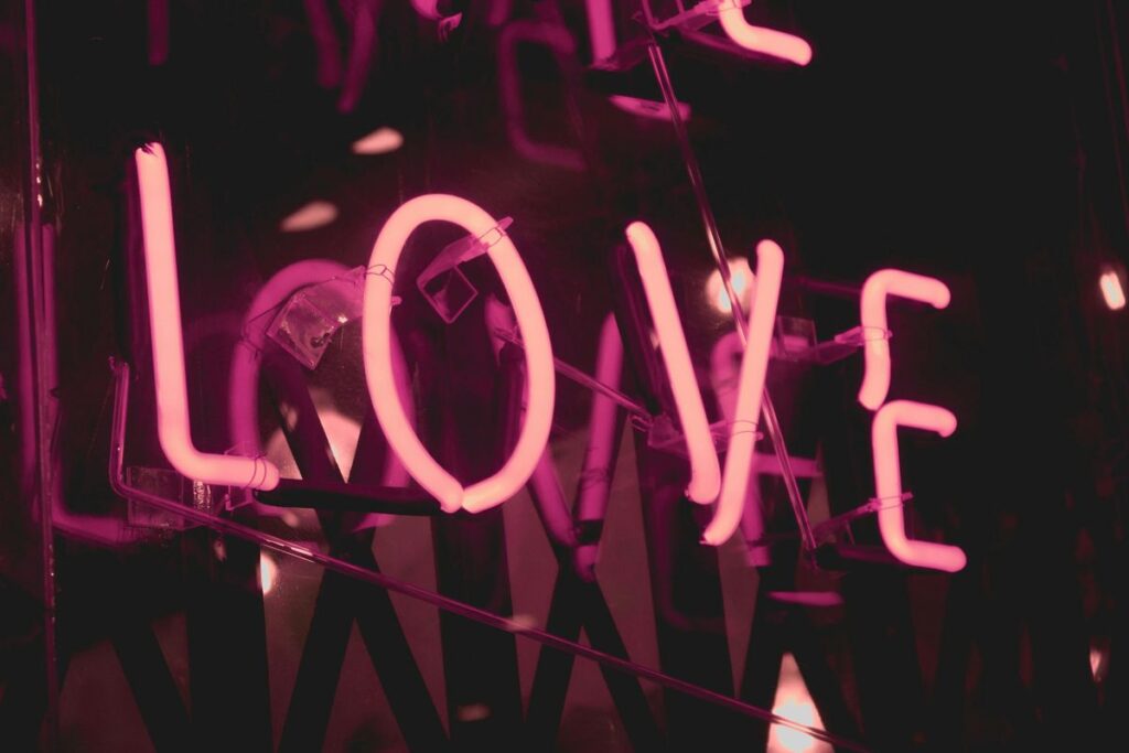 Picture of a neon sign that says "love"