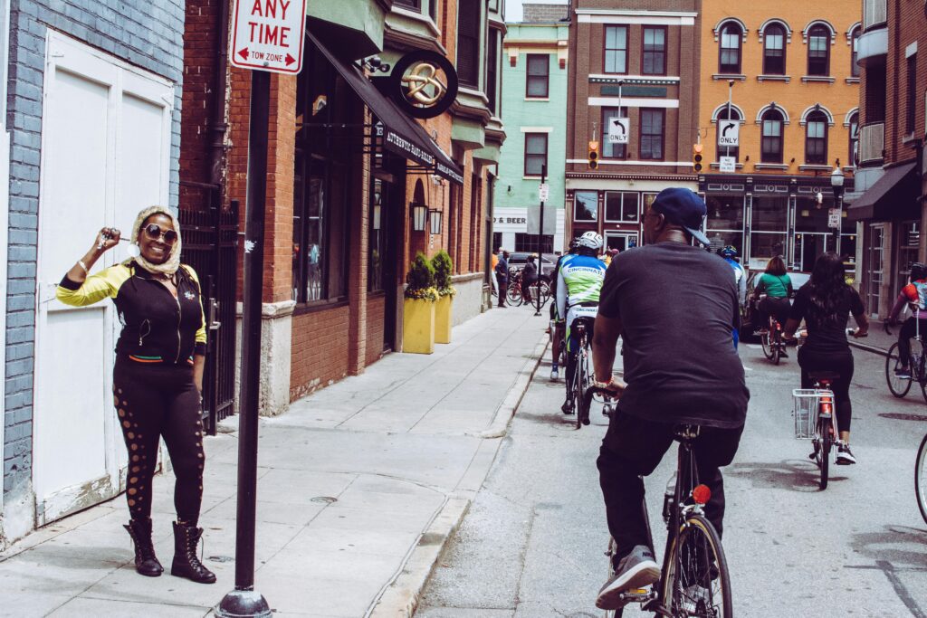 Woman Standing On Side Of Street
