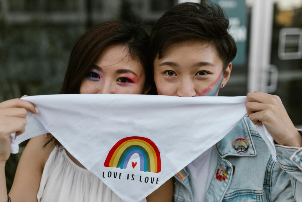 Lesbian Couple Holding Bandana
