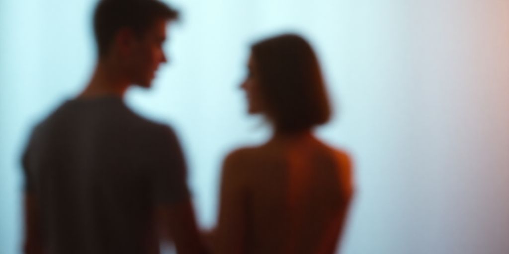 Abstract connection between two figures.