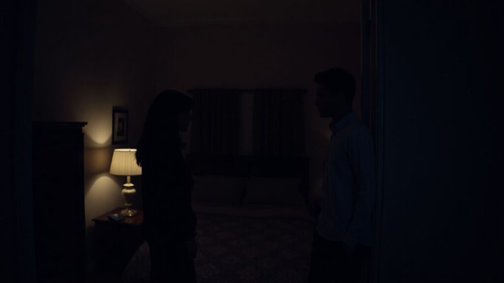 Couple in bedroom, intimate and complex emotions.