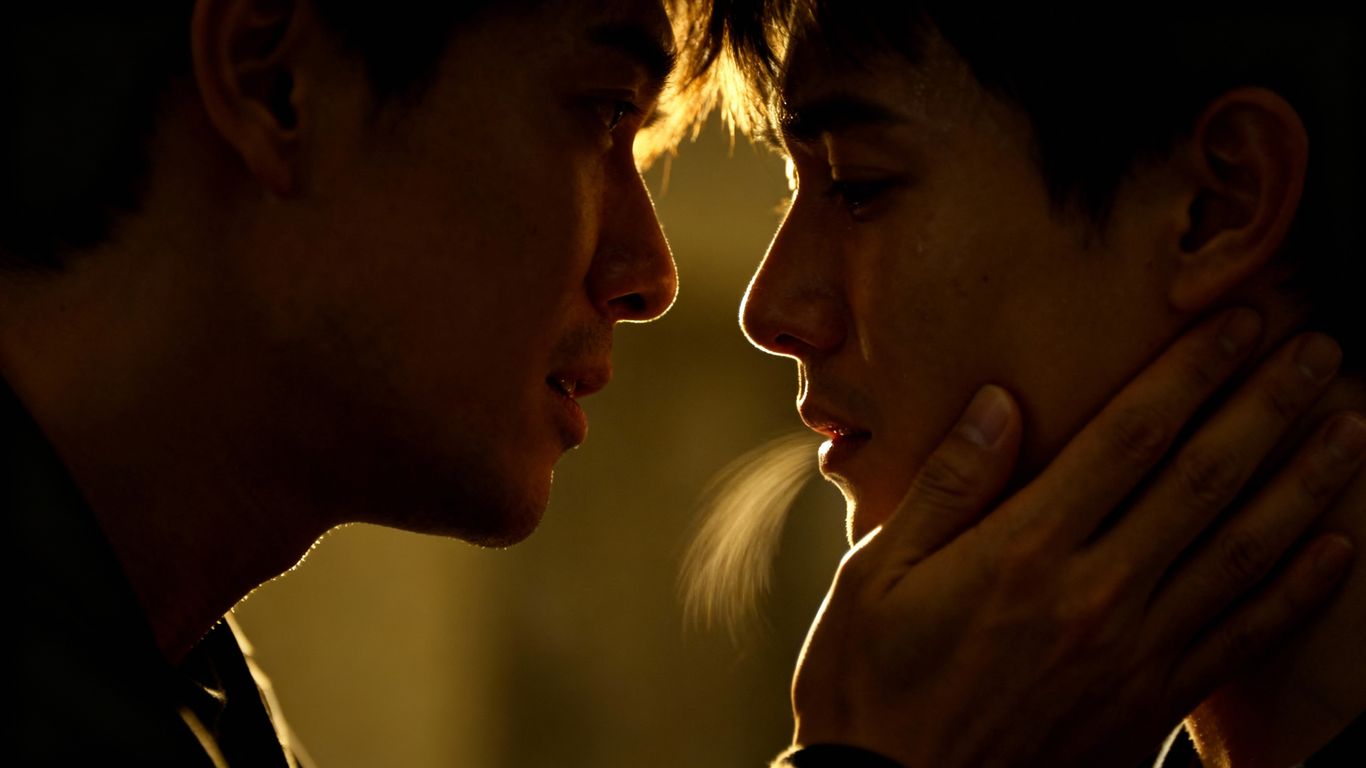 Couple sharing a tender moment of aftercare.